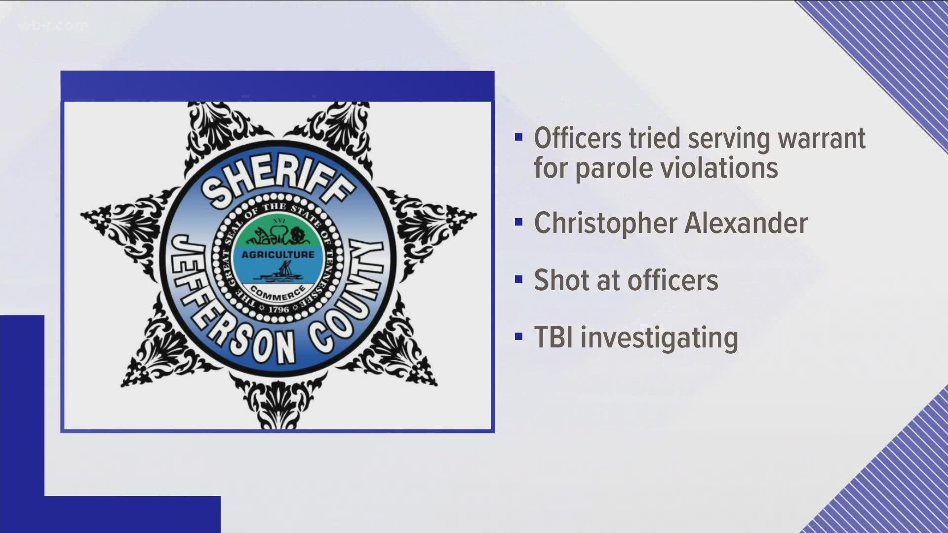 The Jefferson County Sheriff's Office said a man fired shots on them when they arrived at a camper-trailer to serve warrants for parole violations.