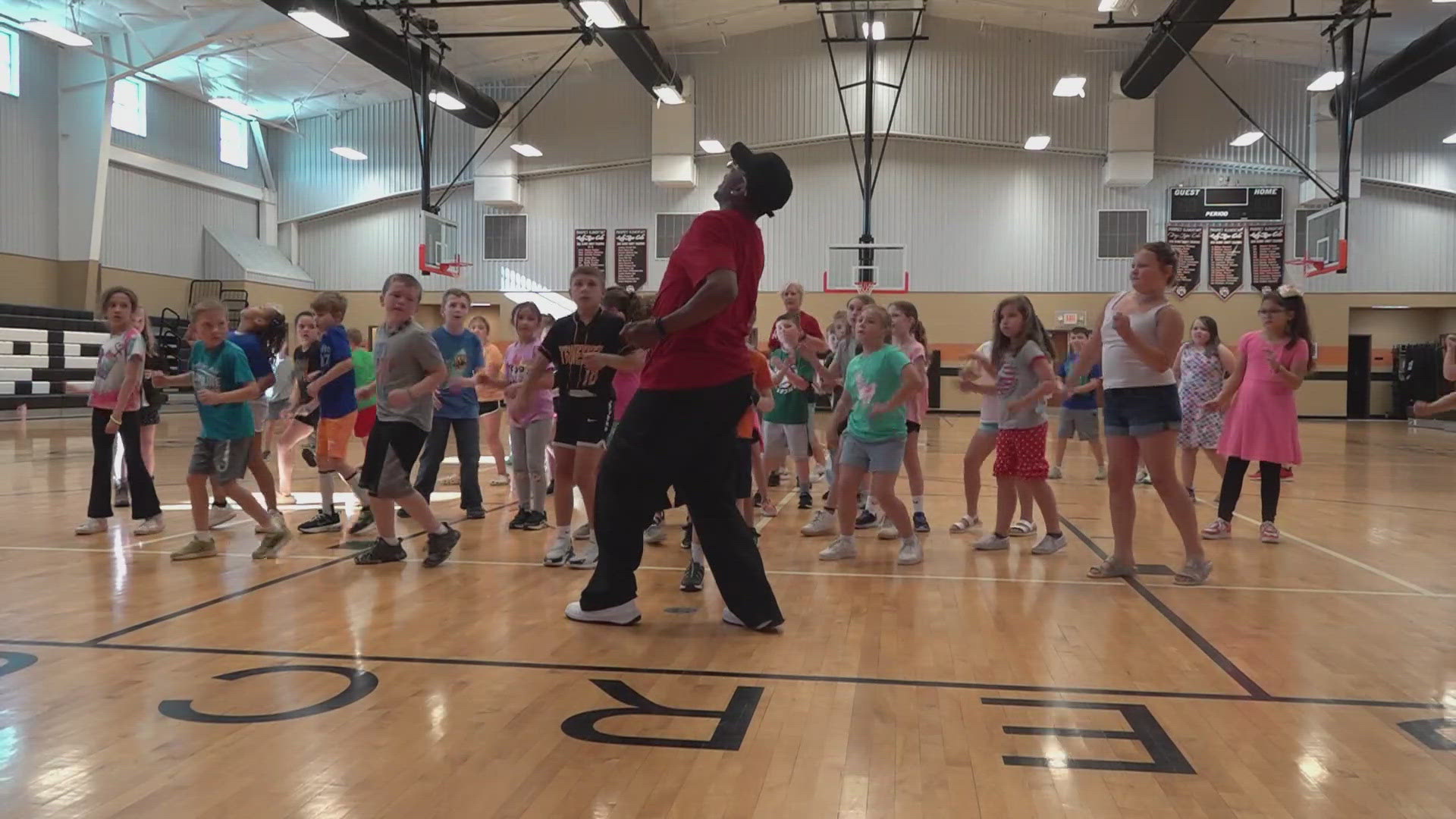 Partnering with Prospect Elementary School physical education teacher Leesa Taylor, Greg Carney combines hip-hop with fitness.