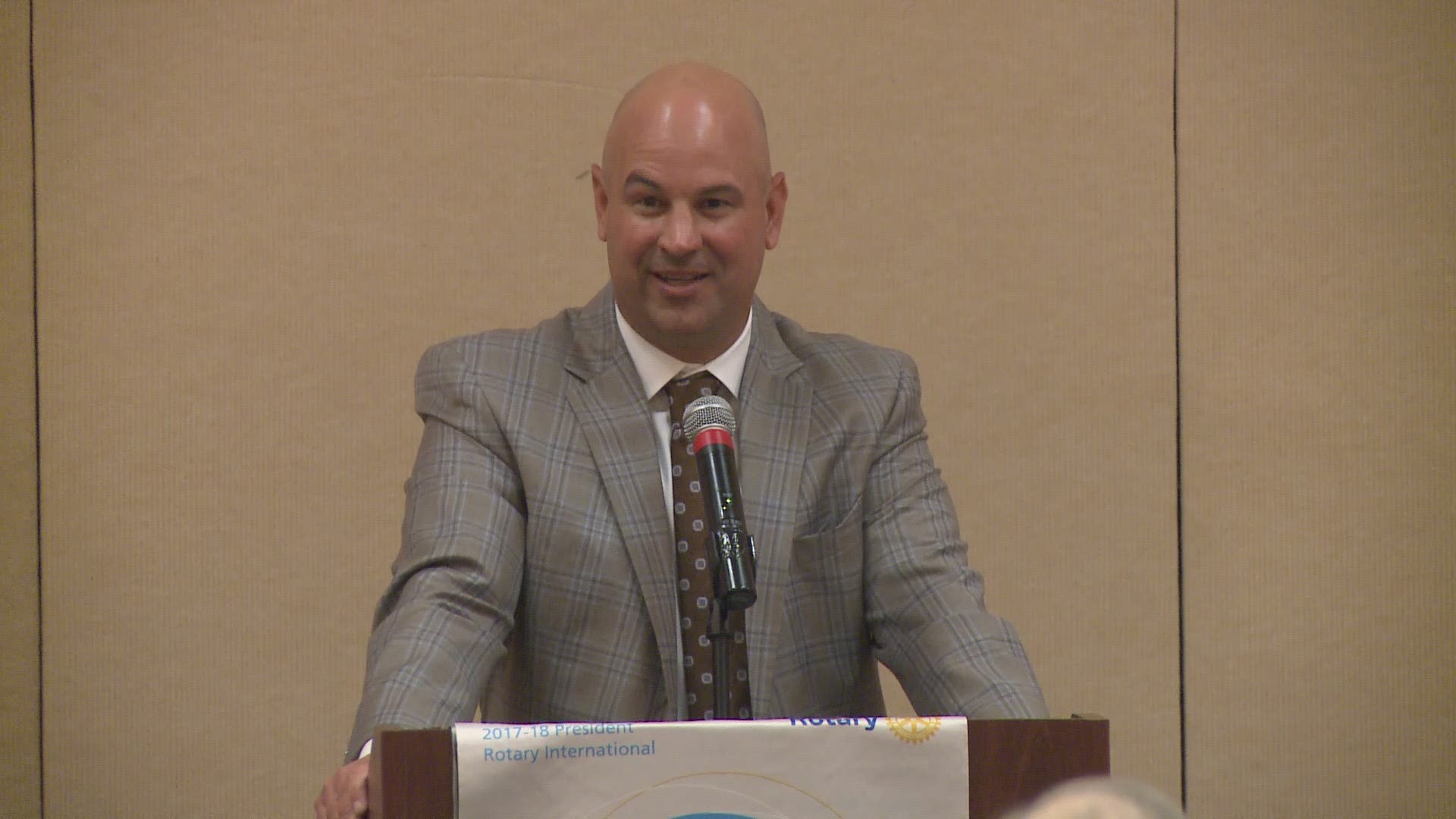 Jeremy Pruitt tells a story to the rotary club about his son somehow already having orange and white checkerboard pants in his closet when he took the Tennessee job even though he was coaching at Alabama.