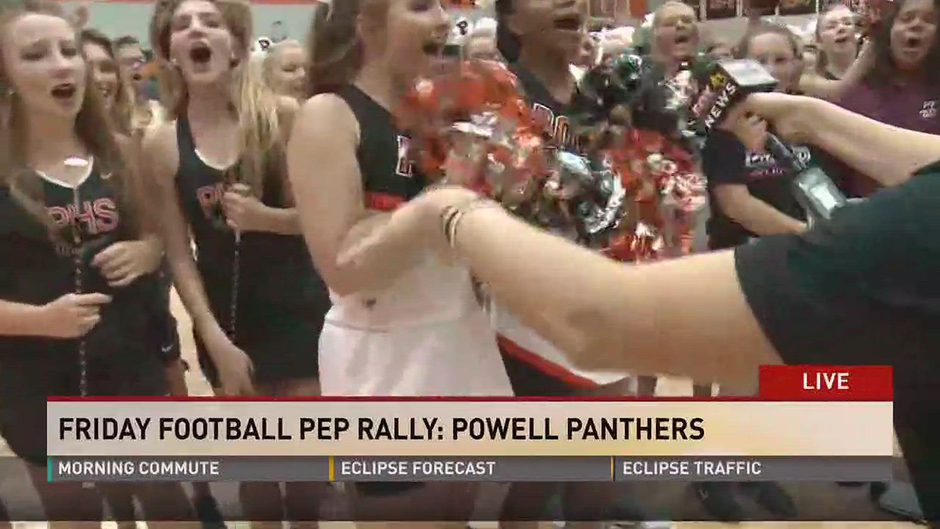Talk about loud and proud school spirit! Rebecca Sweet hangs out with the band and students at Powell High School.