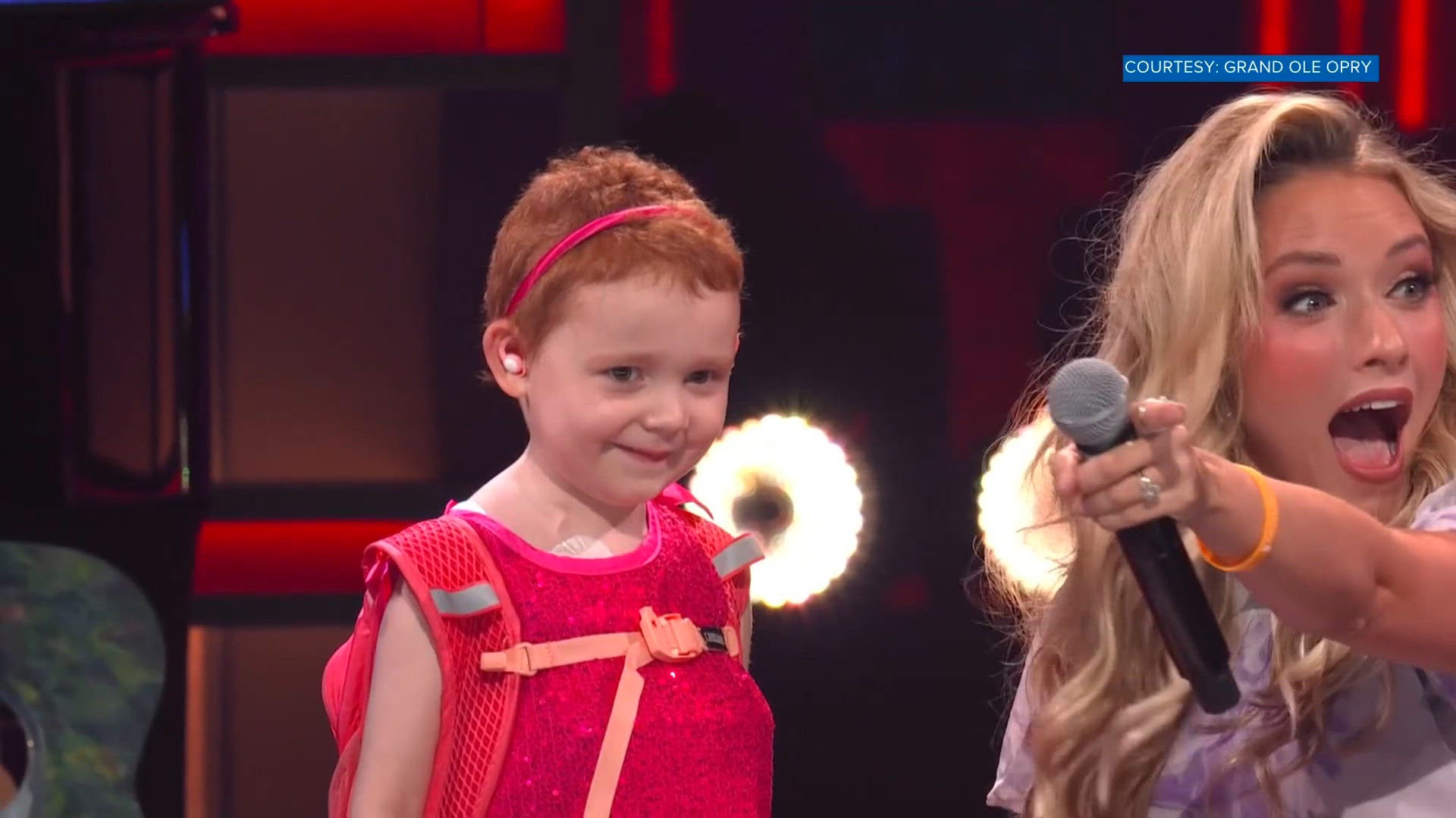 'My cancer's gone' | Knoxville girl gets standing ovation on stage at Grand Ole Opry with Emily Ann Roberts