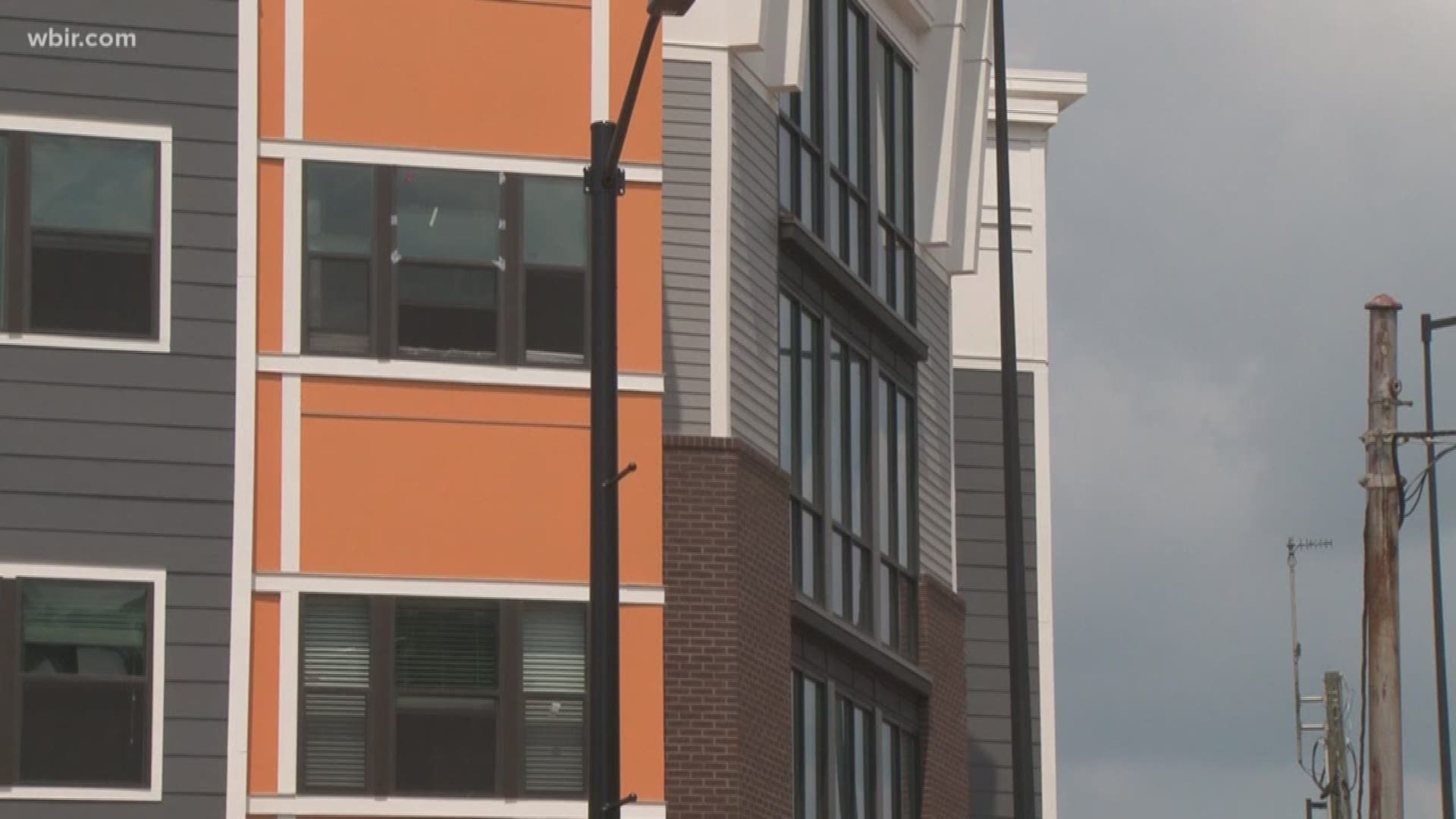 UT Students scheduled to move into the  303 flats near campus are having to stay in hotels.