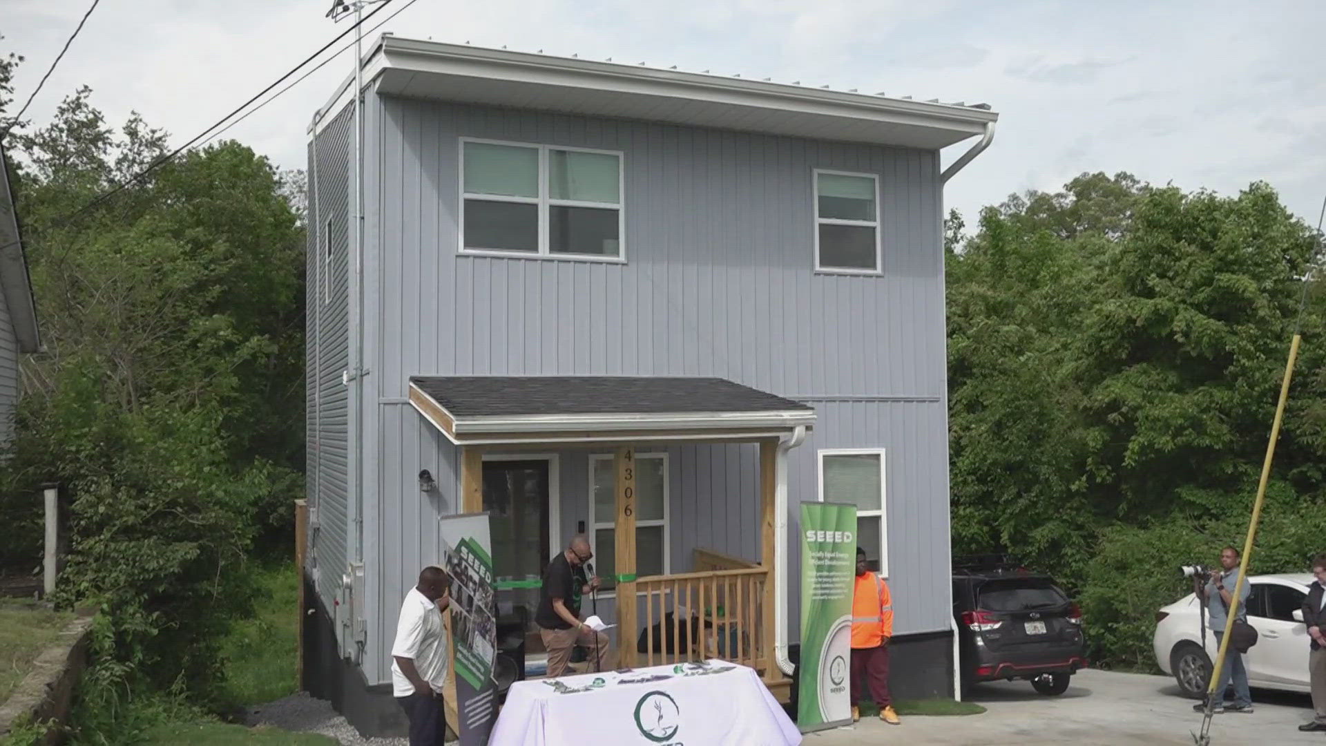 Nonprofit welcomes young family to new solar-powered homes as part of ...