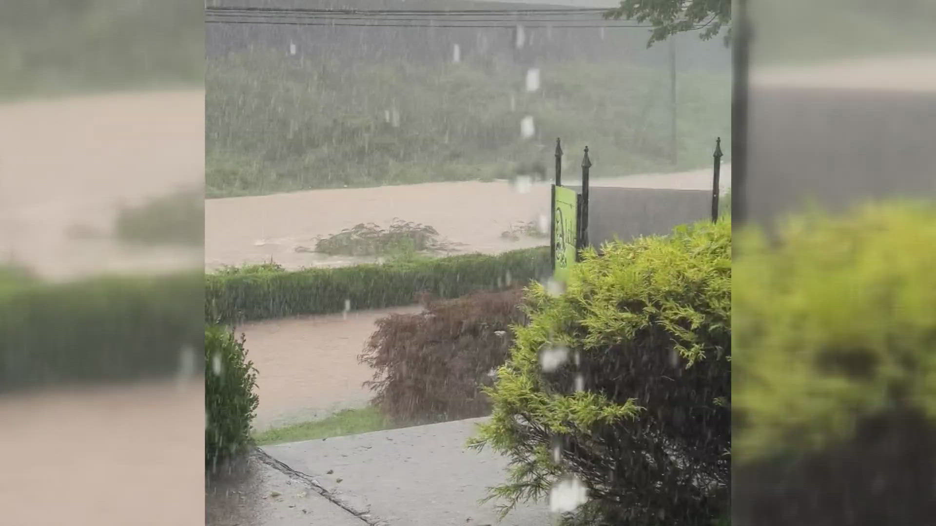 The busy road in Knoxville became flooded very quickly after storms hit the area Tuesday.