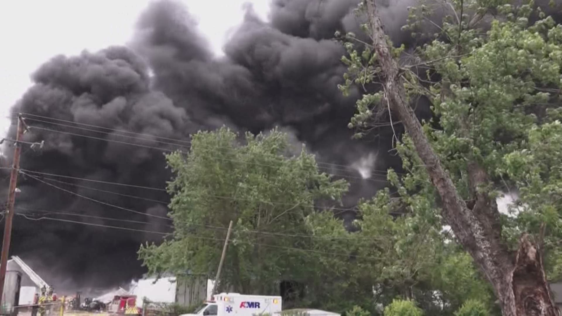 Huge piles of paper, cardboard and plastic were burning and sending a huge plume of black smoke into the air. Many people were concerned that toxic chemicals could be released into the air.