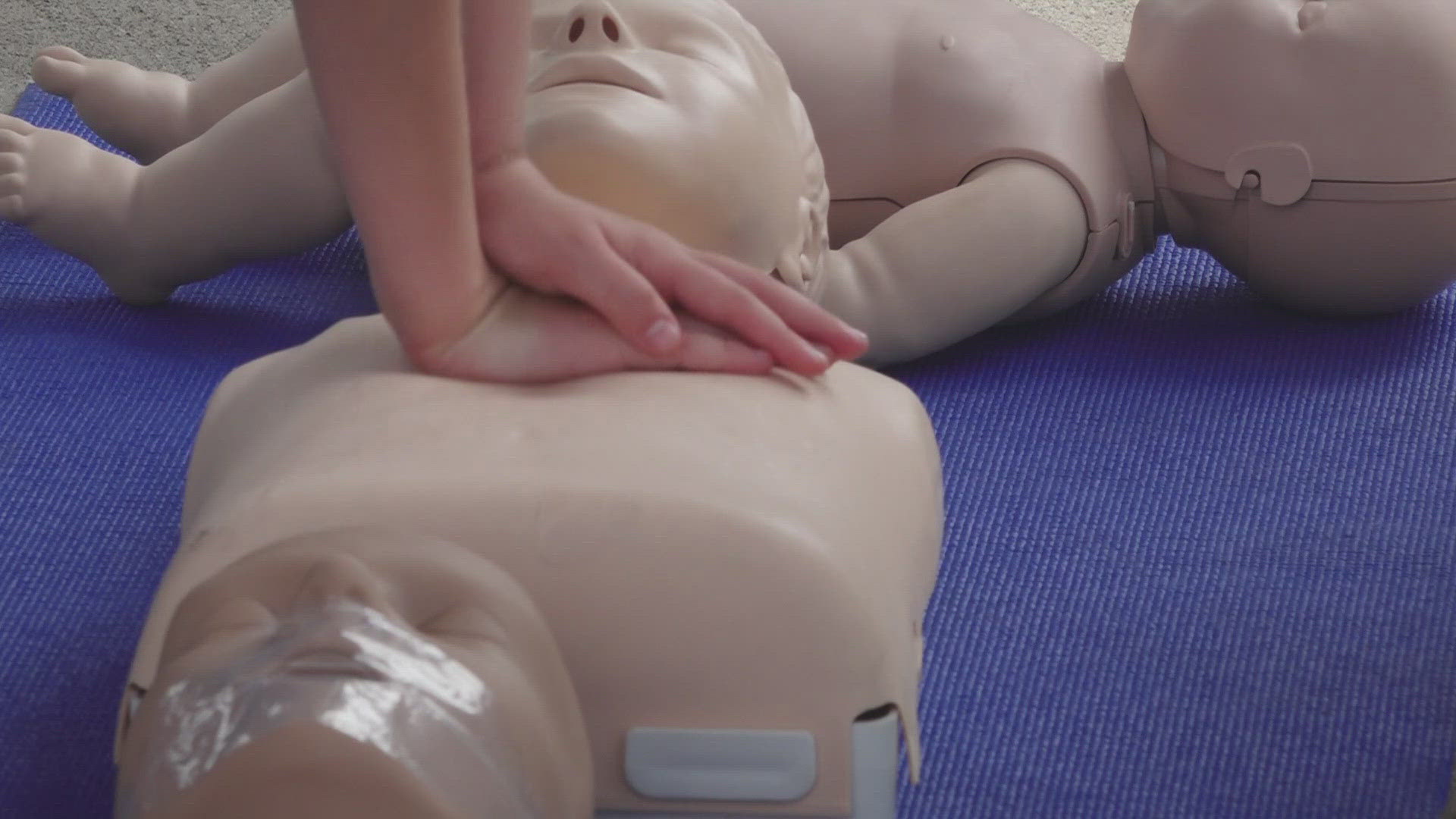 Representatives from the organization stopped by Safety City today to teach kids how to perform CPR hands free. They practiced on baby and adult mannequins.