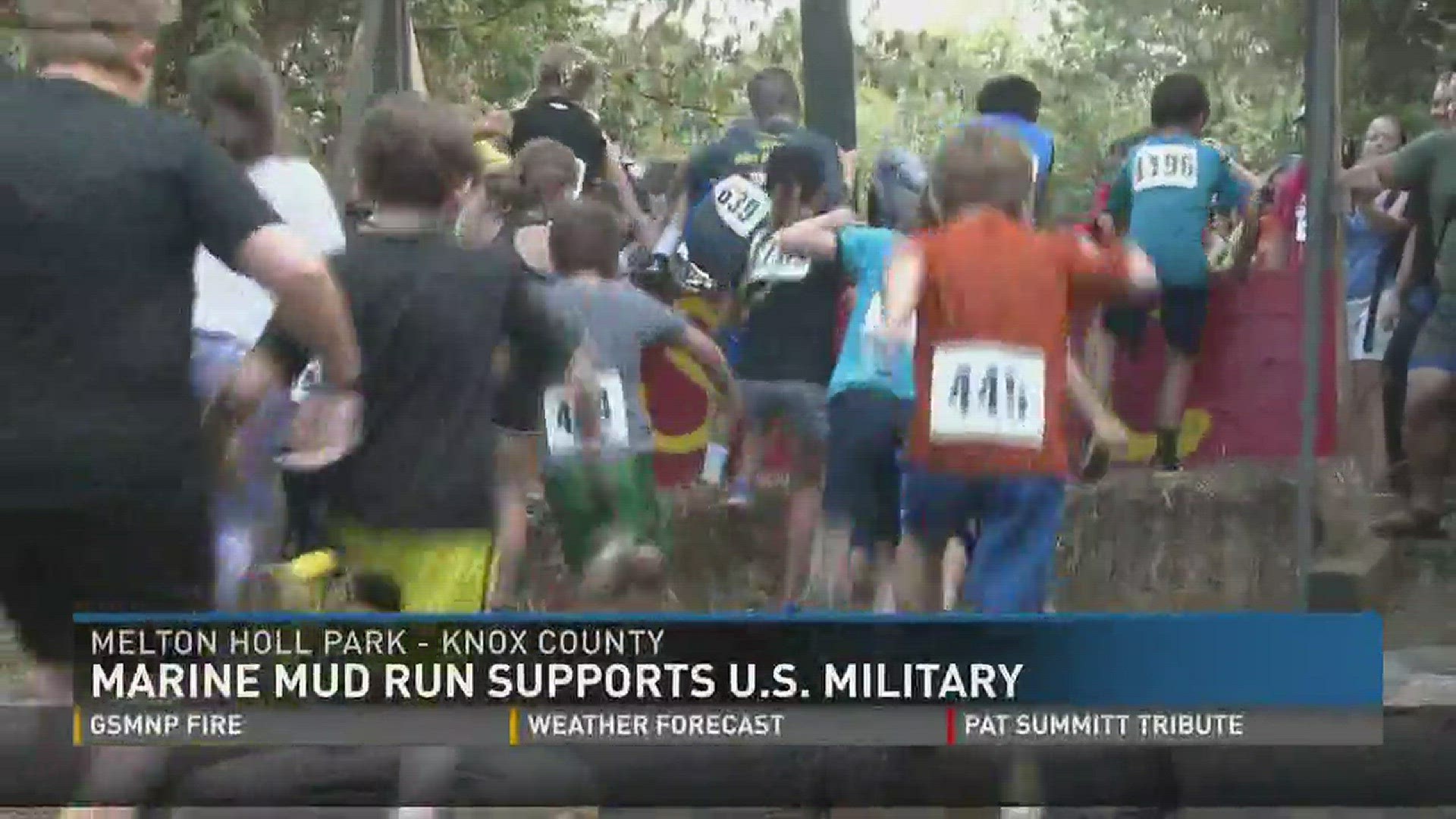 Marines, children and others ran in the mud to help benefit the U.S. Marine Corps.