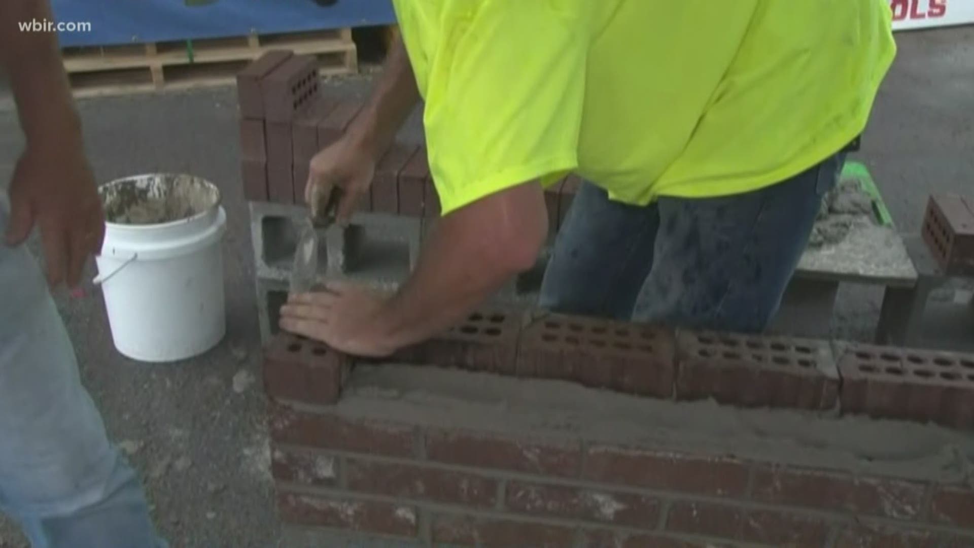 Building a wall from bricks and mortar takes teamwork and skill. Everyone is invited to watch the competition as teams build brick walls. The action starts at 11:00 Saturday, August 24, at A.G.Heins Company in downtown Knoxville.