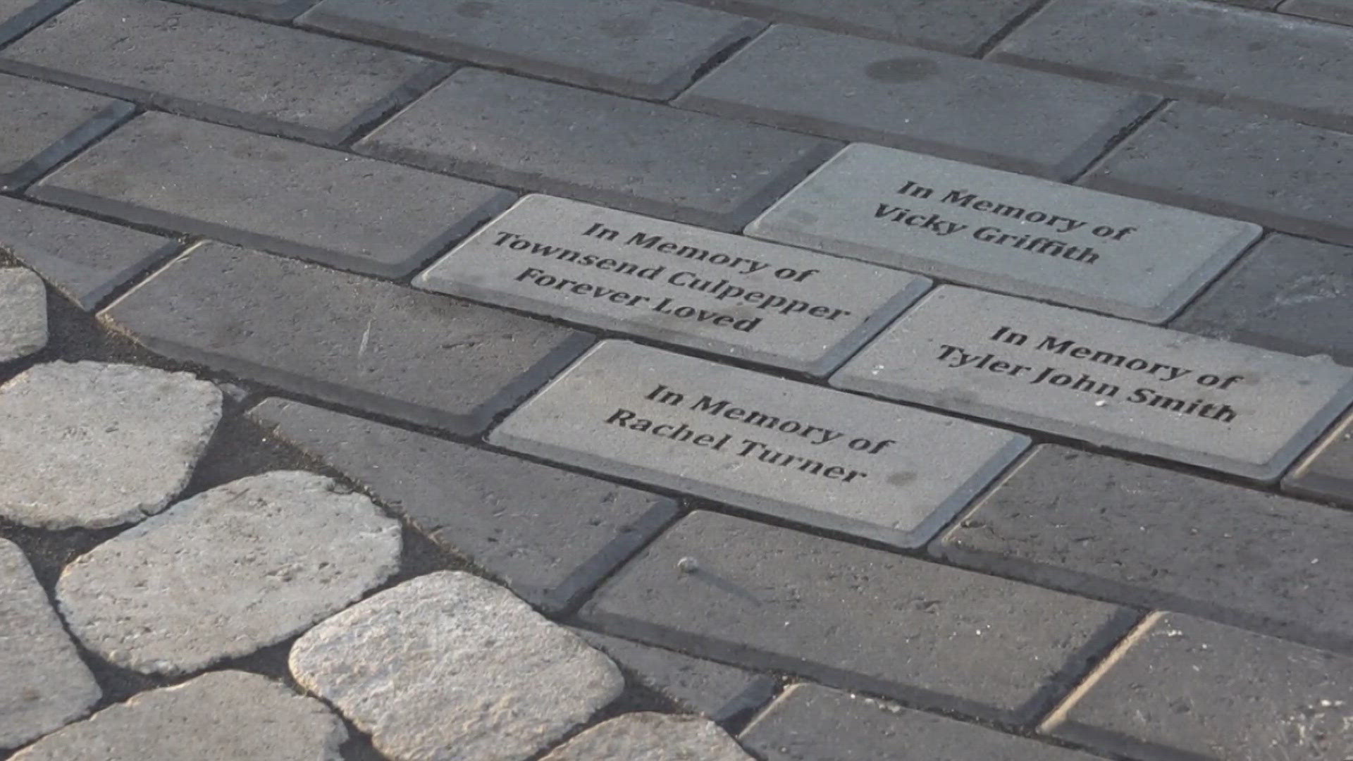 Outside The Gateway, bricks bearing people's names can be seen. Each represents a person who lost their life to addiction or to a person seeking recovery.