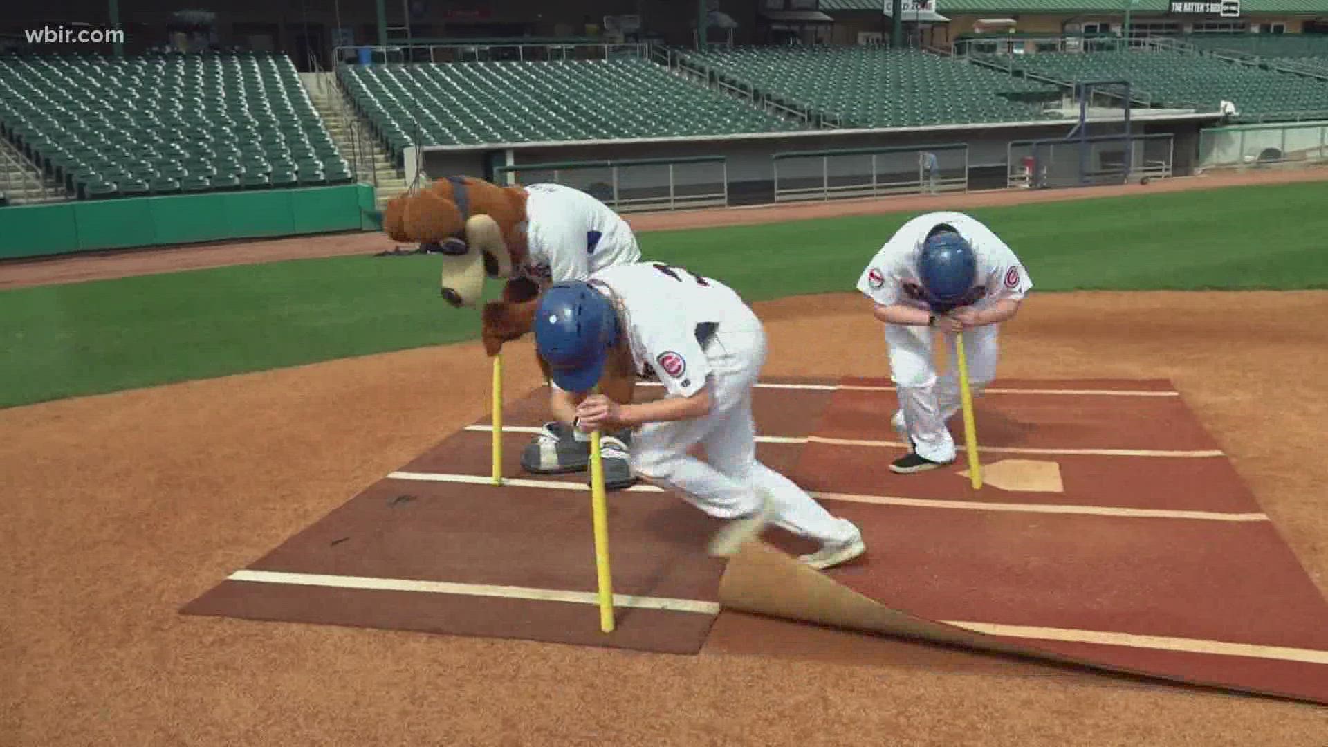 Put your forehead on a bat, spin around 10 times, and run. Those are the rules of dizzy bat, one of the games fans can play for prizes at Smokies' baseball games.