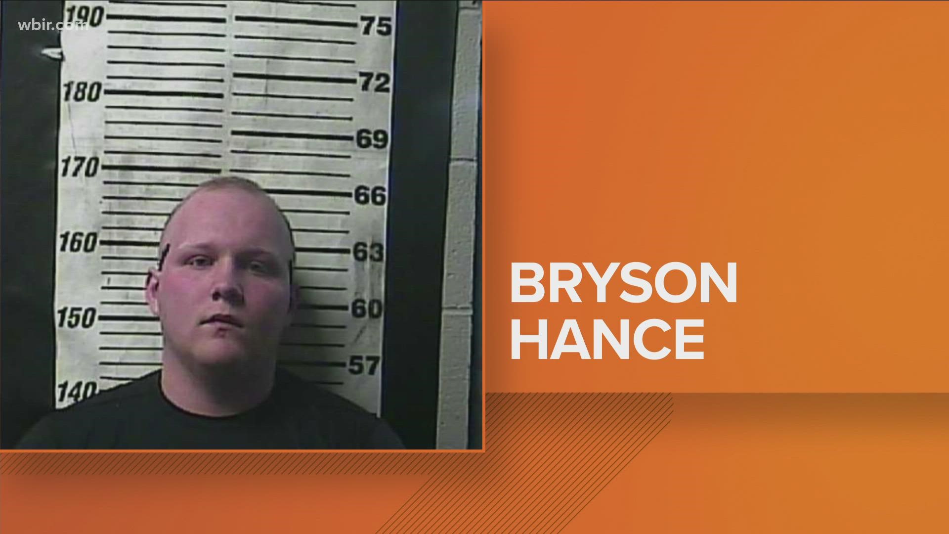 Police say Officer Bryson Hance got into an argument with an inmate being processed.