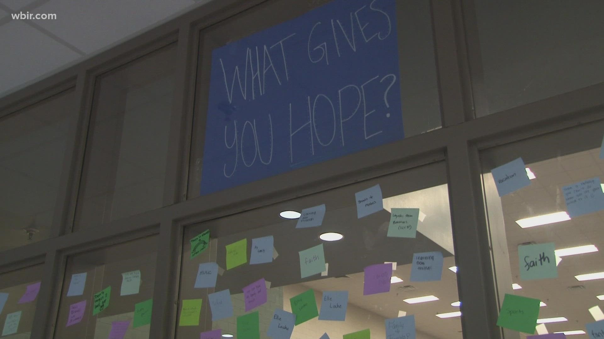Students covered a wall in Hardin Valley Academy with post-it notes sharing some of the things that give them hope.
