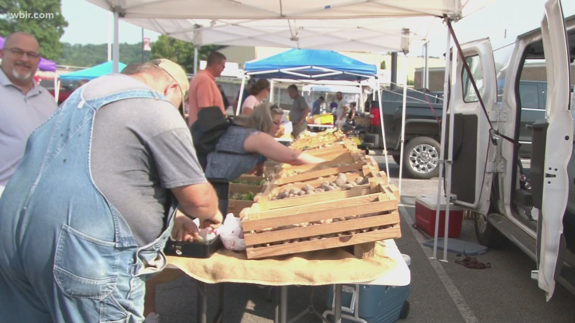 The Clinton farmers' market held a ribbon-cutting ceremony for its newest downtown location.