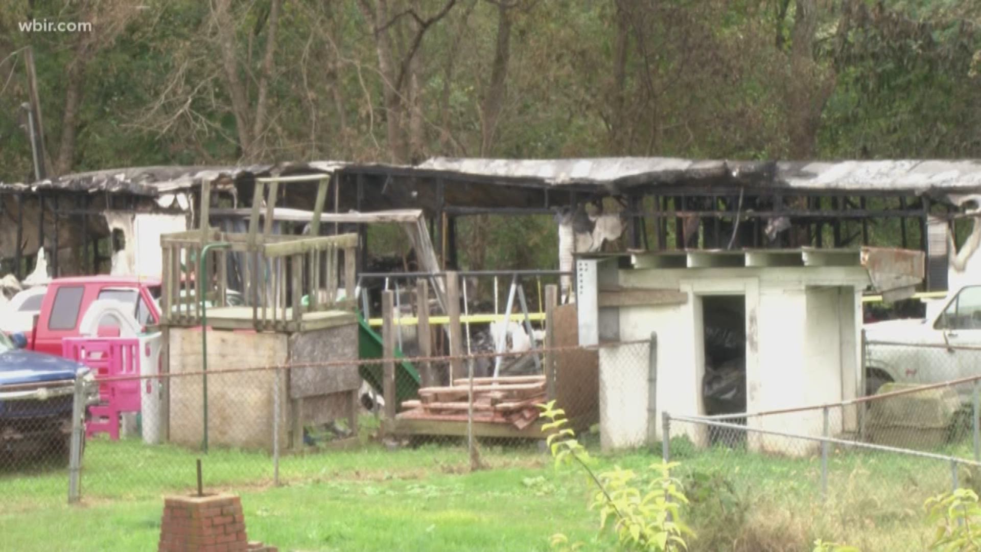 The fire burned through a single-wide trailer home just after 5 a.m. on Oct. 14.