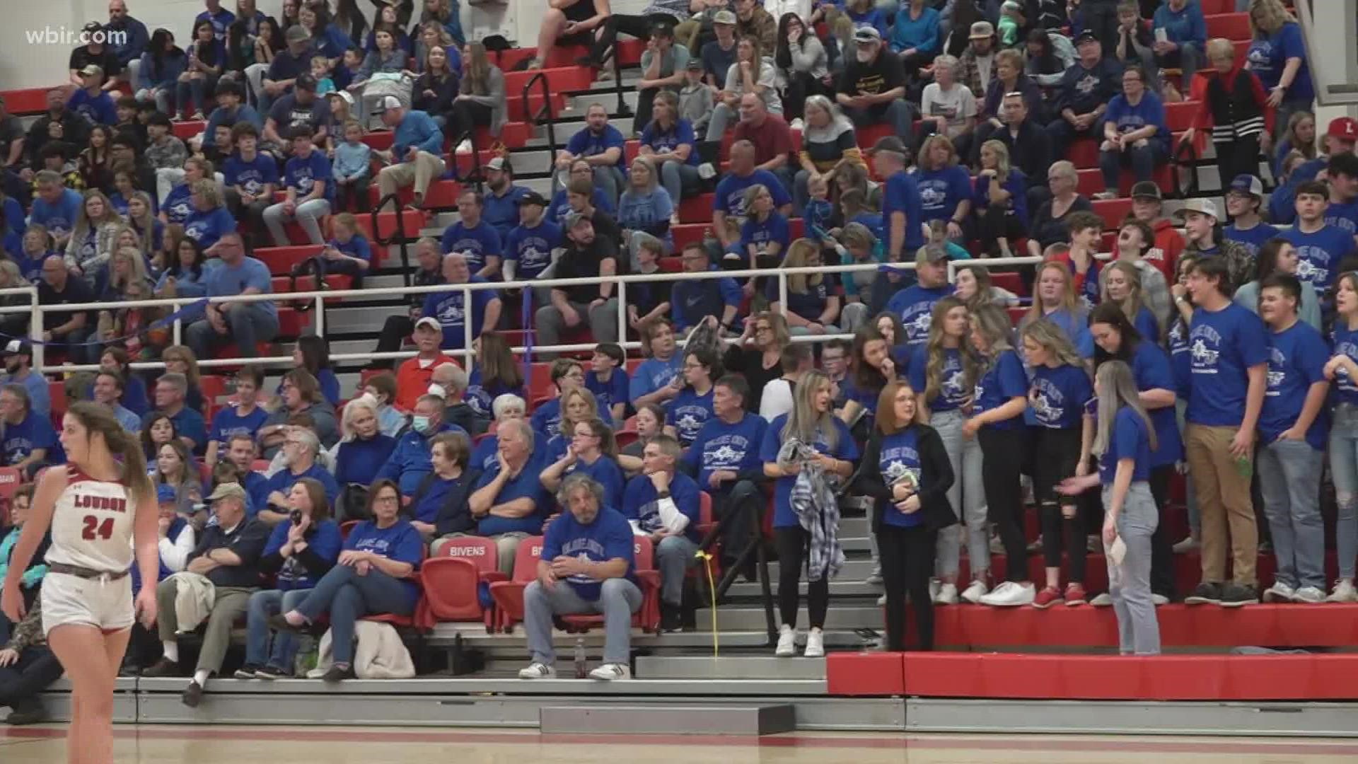Both teams wore blue during a basketball game to honor the memory of a fallen Loudon County deputy.