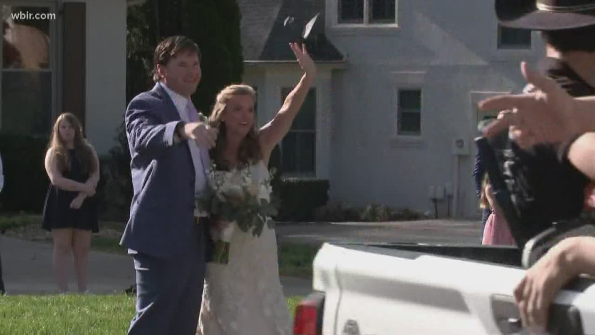 Couple Invites Friends To Drive By Wedding Reception