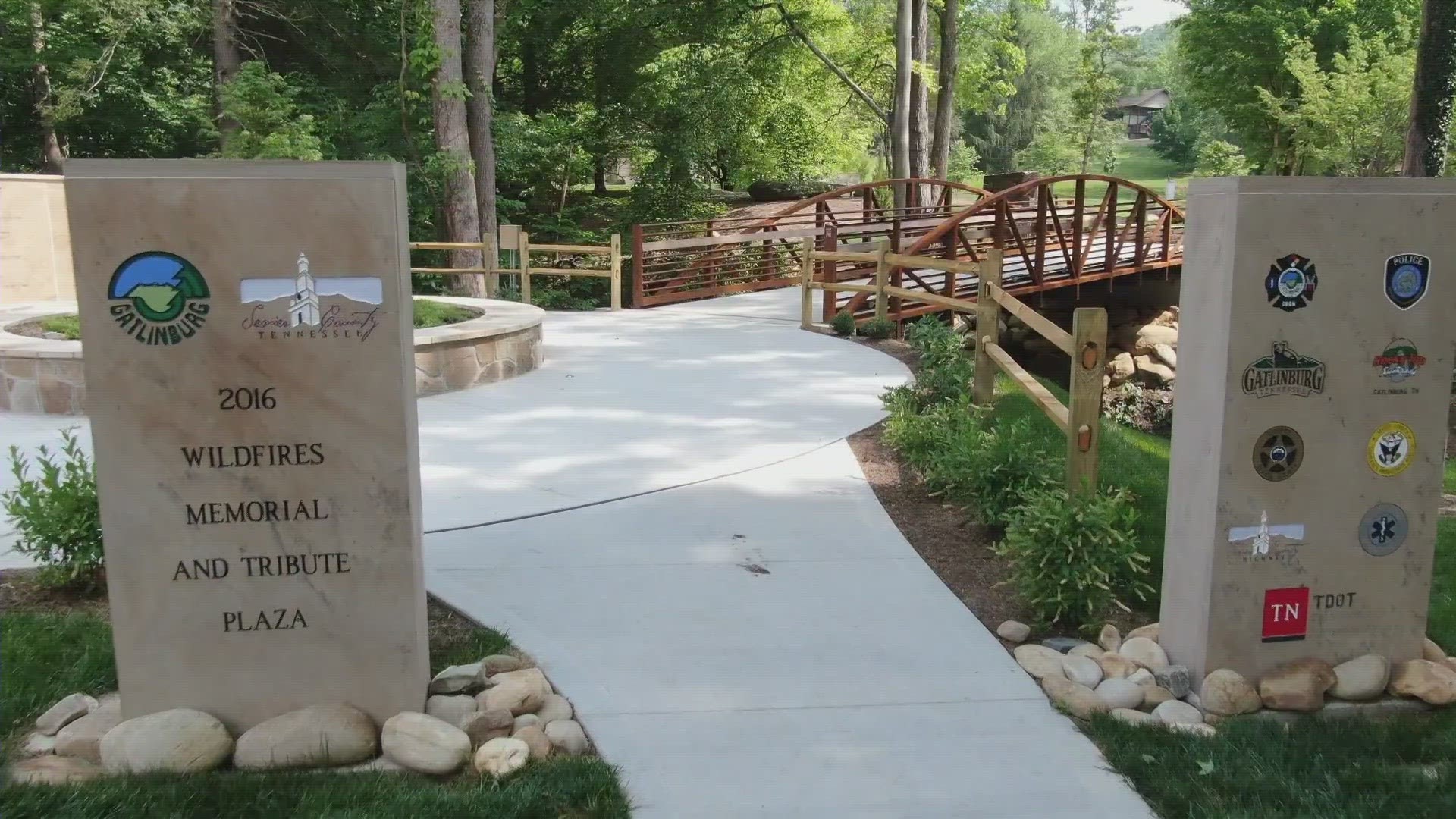 A local engineer explains the design of the memorial plaza for the 14 lives that were lost in the 2016 Gatlinburg wildfire and the first responders.