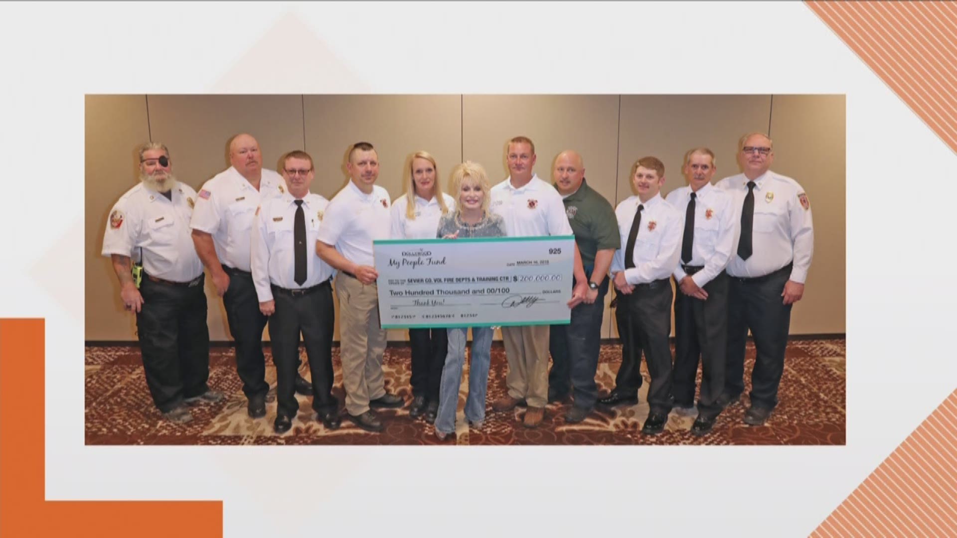 Dolly Parton Met with all of the chiefs of the departments at Dollywood's DreamMore Resort and Spa to make the $200,000 donation.