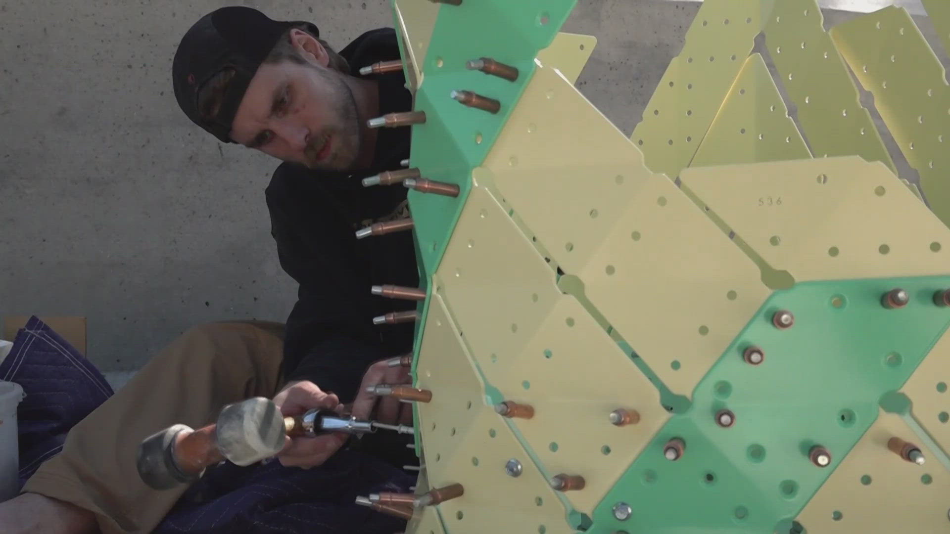 Crews put on finishing touches on artwork at Cradle of Country Music