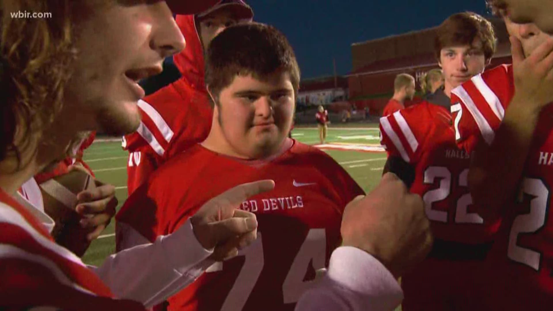 Students and athletes come together to make football dreams come true at Halls.