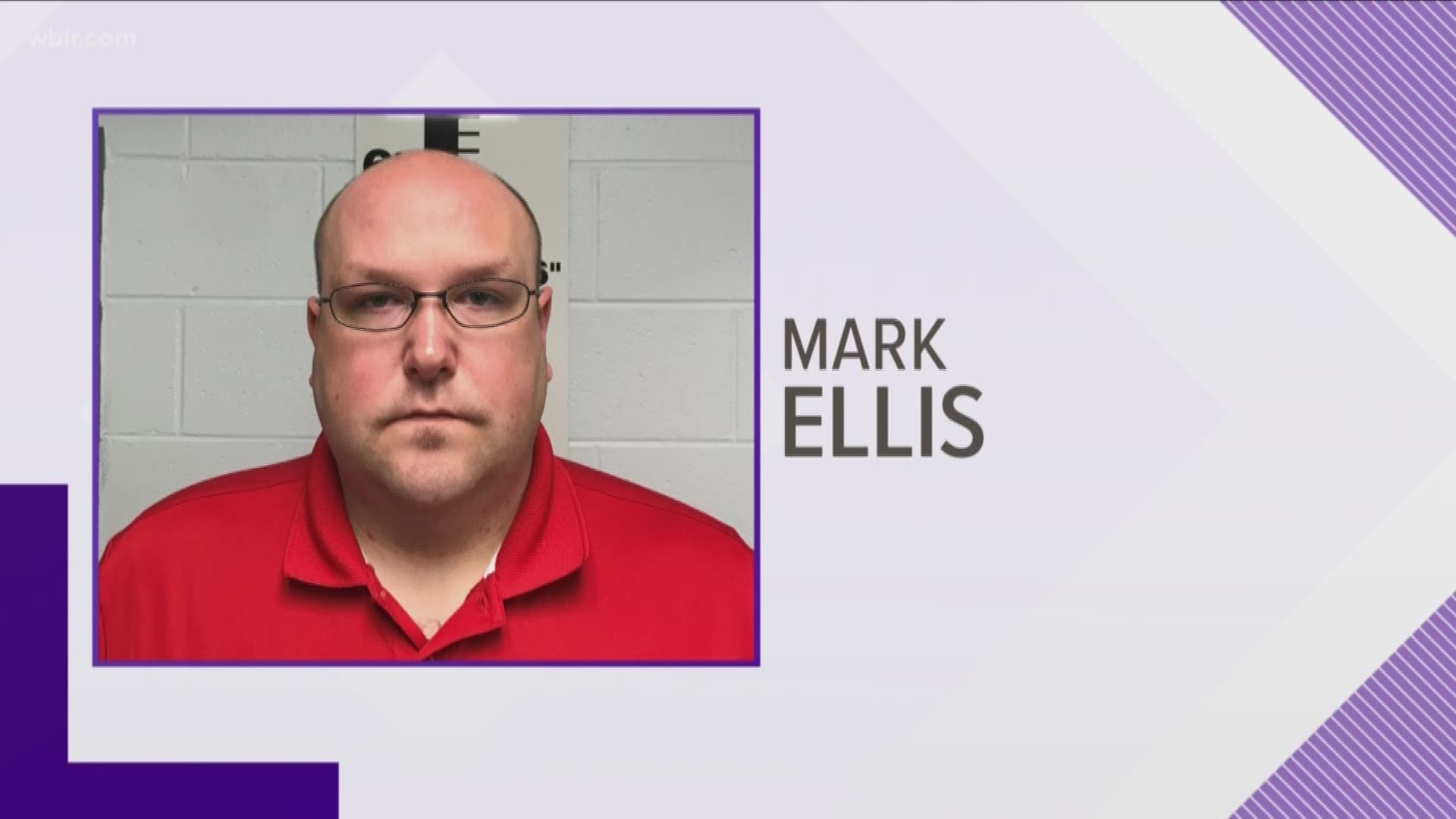 Investigators said Mark Ellis turned himself in Monday after being indicted on charges of assault on an inmate.