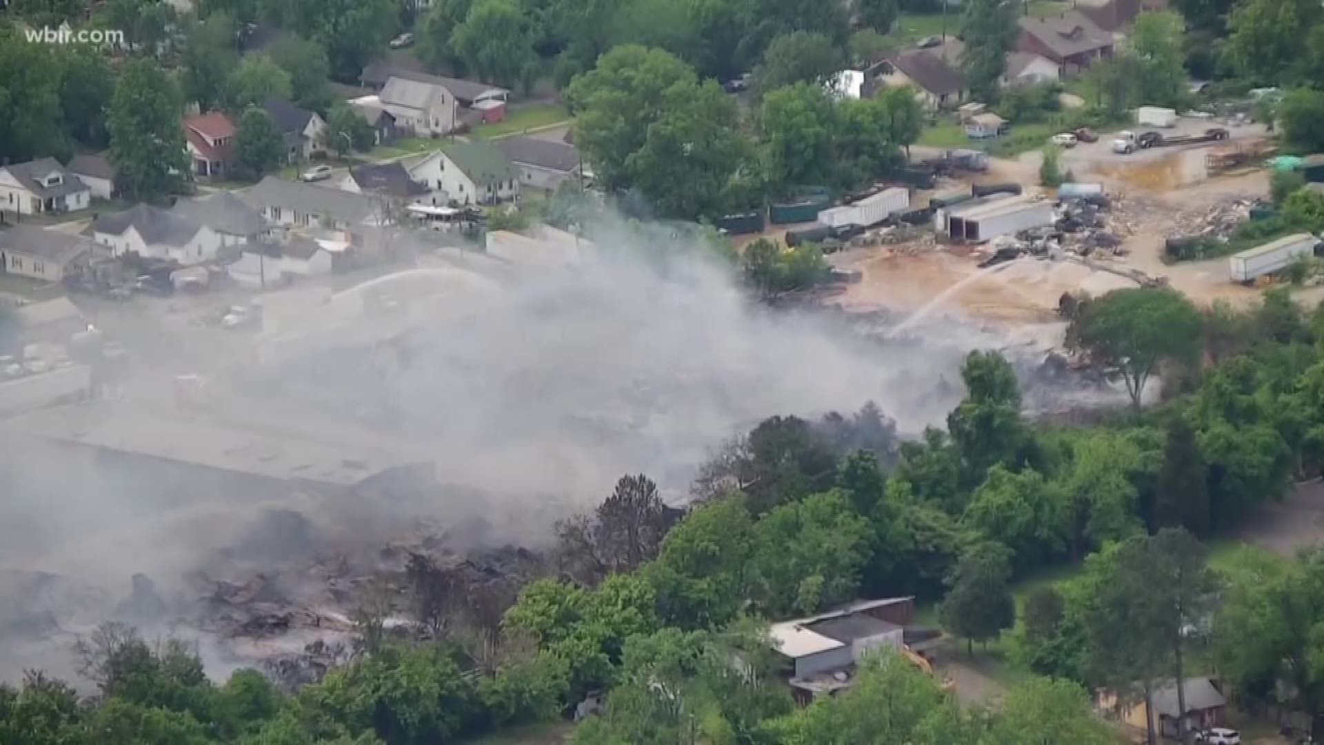 Crews were still fighting a massive fire at the Fort Loudon Waste and Recycling Center in North Knoxville on Thursday afternoon. The Knoxville Fire Department says the fire is contained, but that does not mean it is under control.