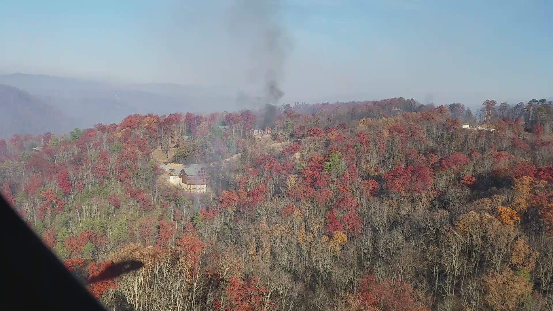 View from the cockpit of Black Hawk as pilots make bucket drops on structure/wildfire. Courtesy: Tennessee Army National Guard