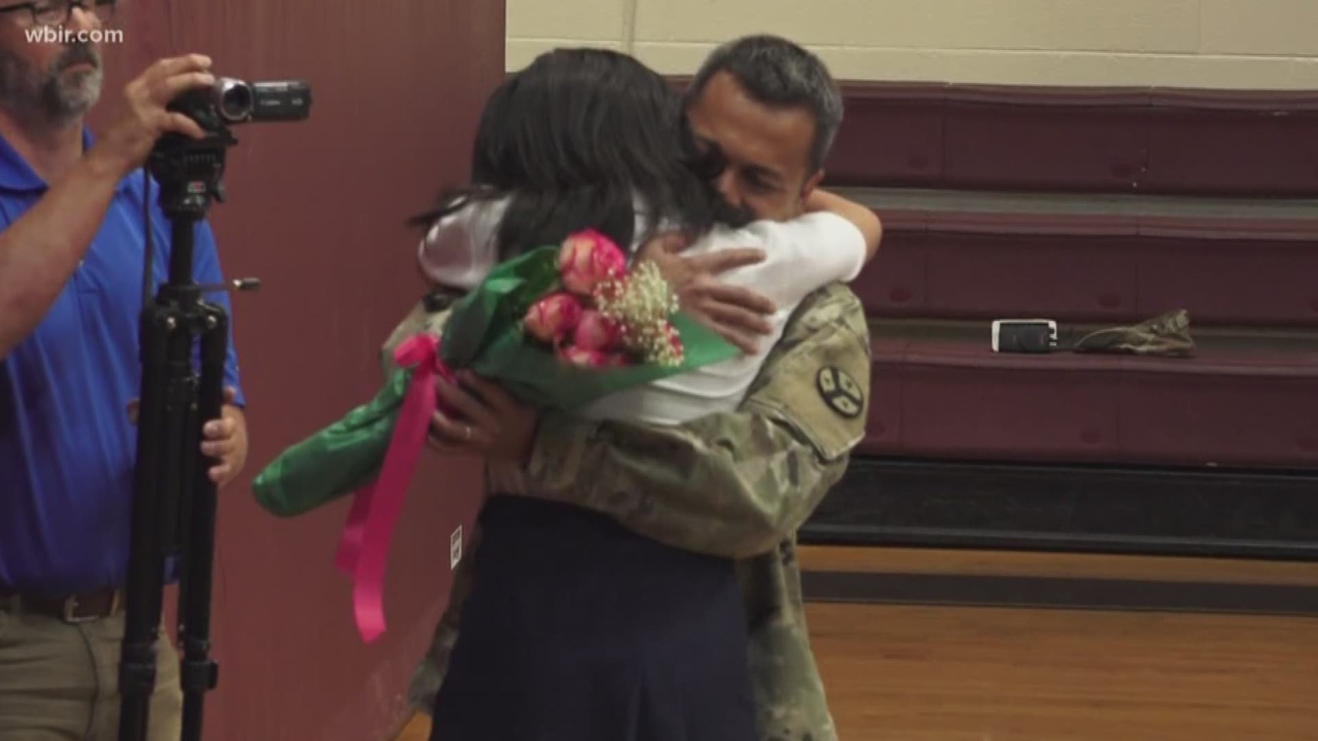 Students at Sacred Heart School gathered in the gym for an award ceremony this morning, and that's when one 6th grader got a special surprise from her father.