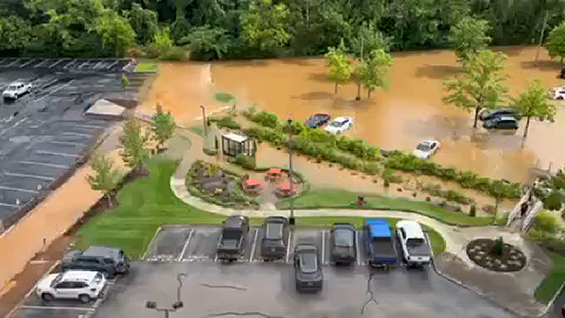 Video of parking lot adjacent to Aubrey’s Papermill flooding
Credit: Justin