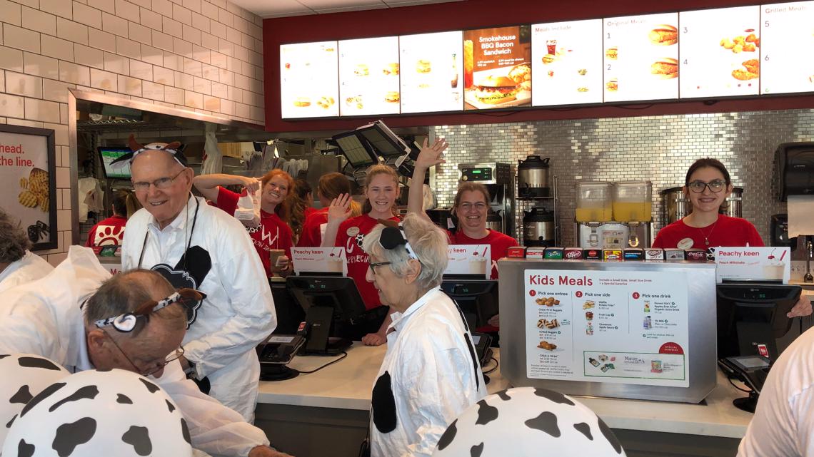 Seniors celebrate Cow Appreciation Day at ChickfilA by donning their Cowday best!