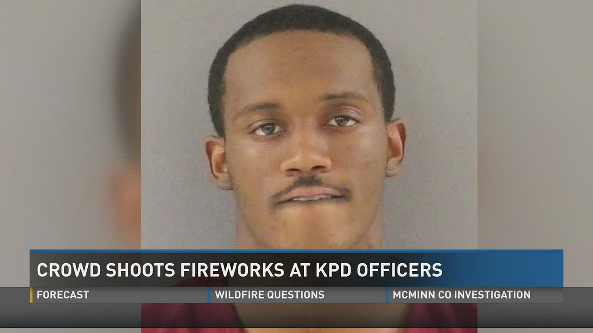 Knoxville police took a man and two juveniles into custody in the Lonsdale community Tuesday after a large crowd of people began shooting fireworks at them.