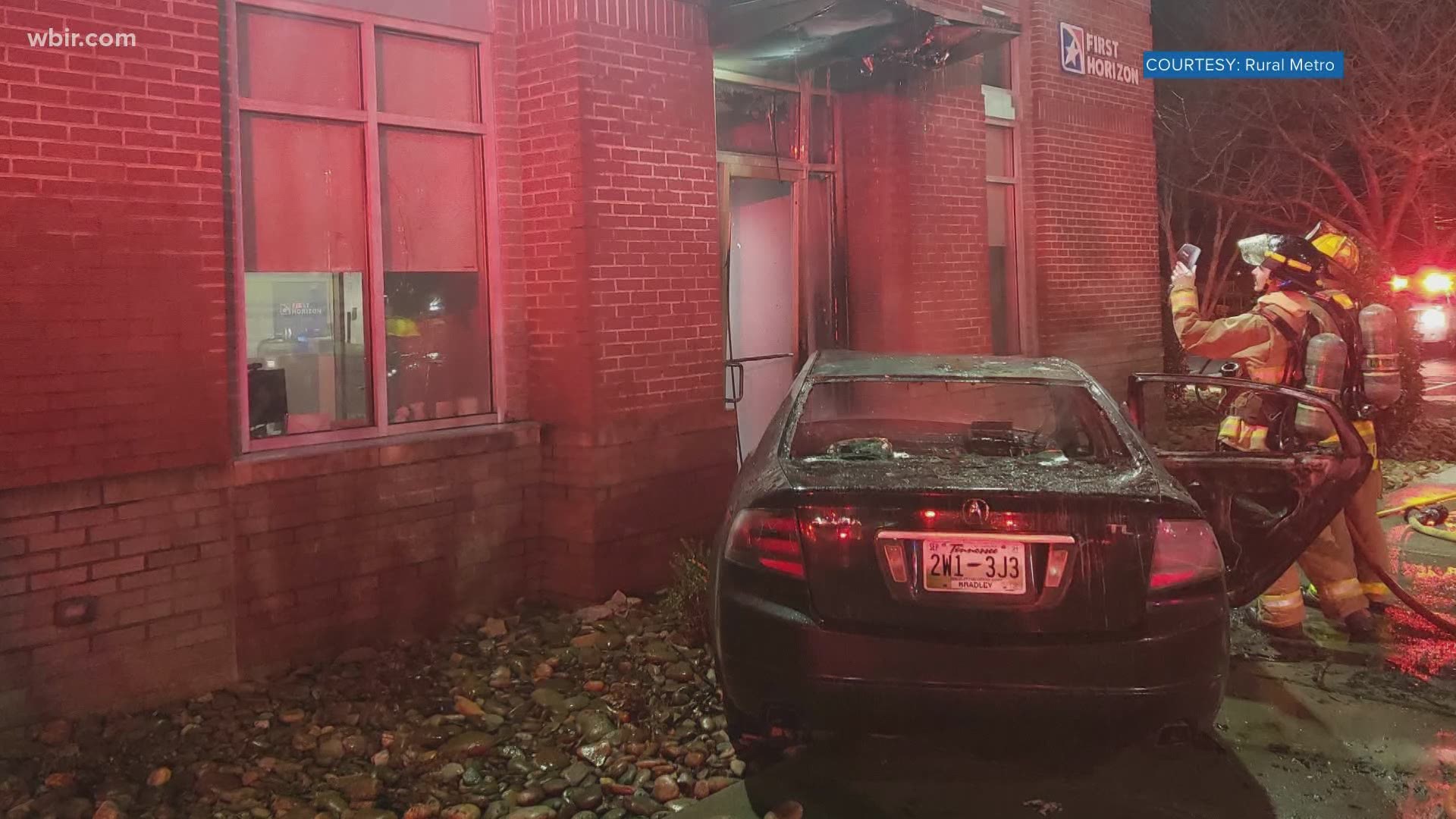 When crews arrived, they discovered the car crashed into the front door of the First Horizon Bank and burst into flames. Officials said the driver left the scene.