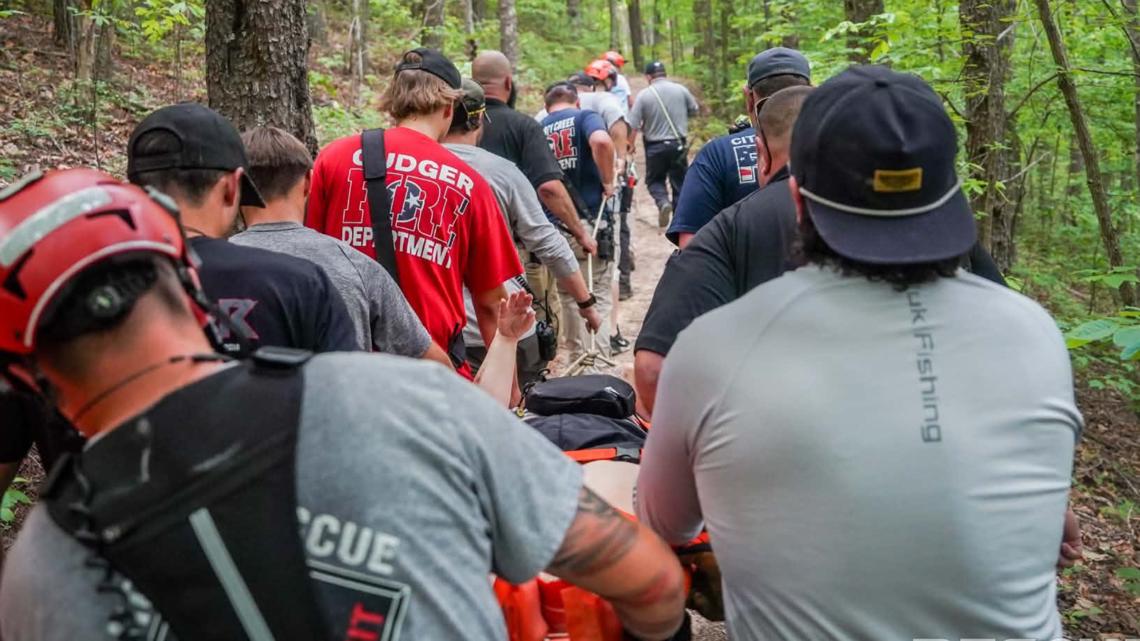 Monroe County Rescue Squad said the woman was transported to Sweetwater Hospital after crews wheeled her up the trail in a Stokes basket.