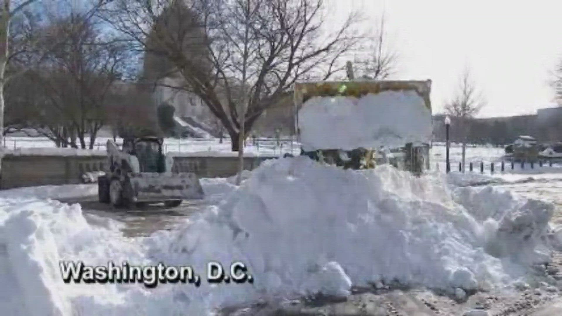 The sound of heavy equipment clearing snow was in the air from Washington, D.C. to New York Monday.