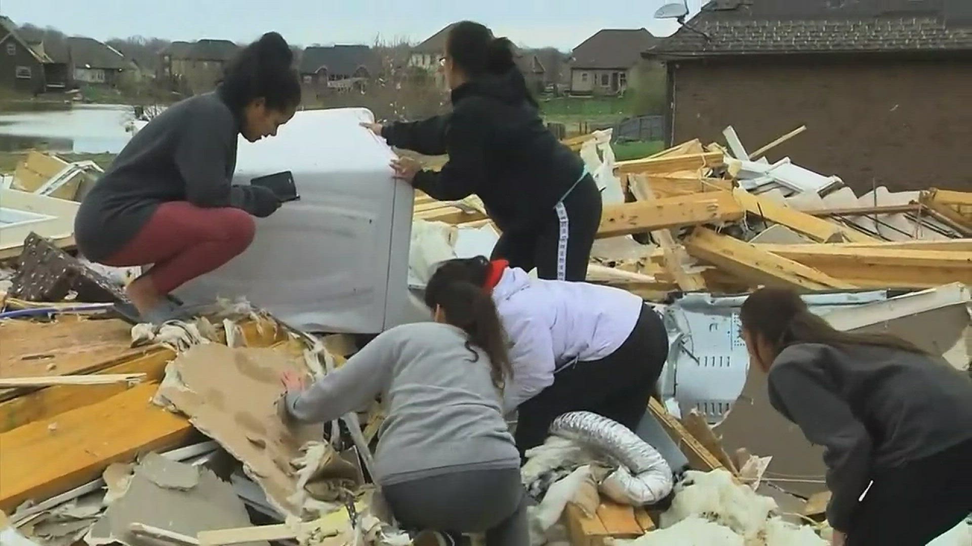 A tornado destroyed a Clarksville family's home with their dogs and a cat inside. Their neighbors helped them search the rubble for their pets. WSMV video