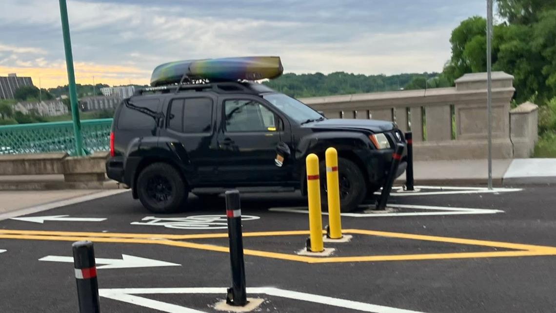 KPD said a driver in a black Nissan fled after damaging trees and property near the Gay Street Bridge Saturday morning.