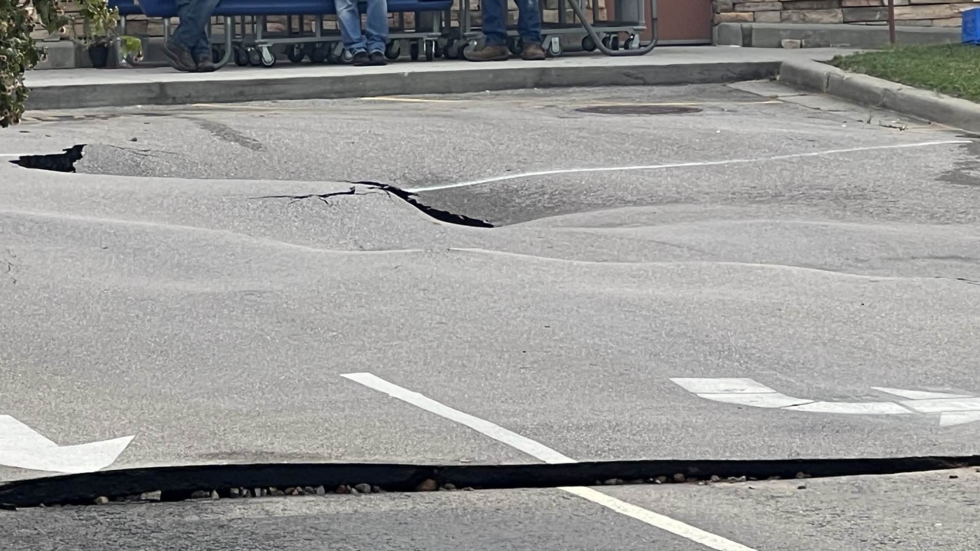 Kroger said the sinkhole opened up after a fire main broke and damaged the pavement. They believe it may be 16 feet deep.