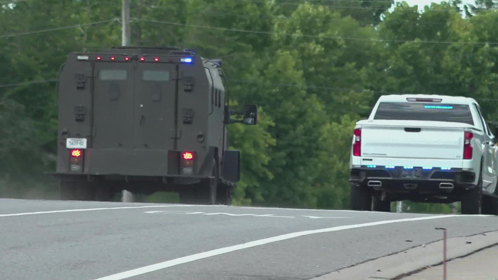 A man suspected of murdering another man Friday at a Lonsdale corner store is dead after deputies said he shot and killed himself during a standoff.