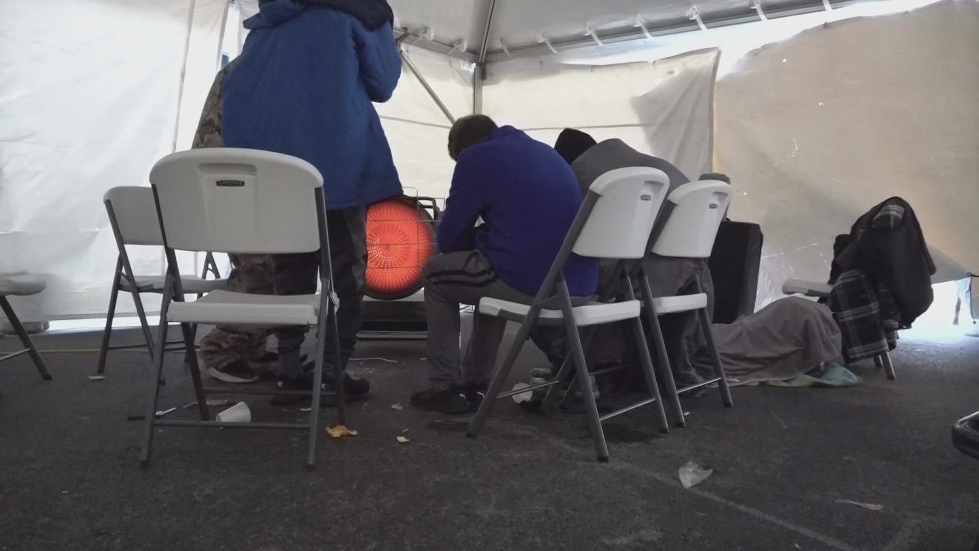 Multiple agencies working to manage an emergency warming tent on Broadway. They are trying to get people off the streets and help them stay warm amid extreme weather