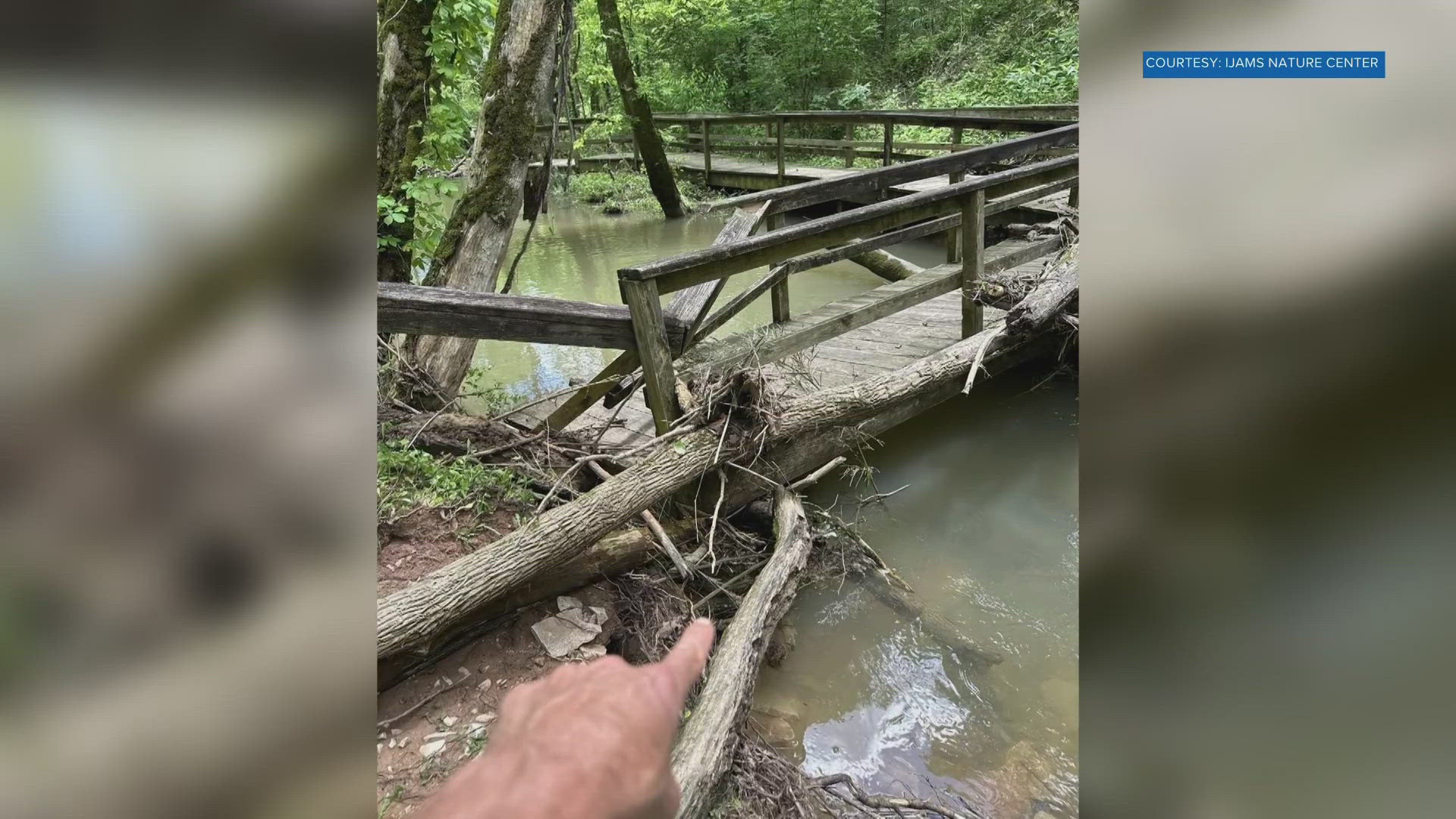 Managers say the Toll Creek boardwalk was damaged by a tree. They say high water carried the tree downstream.