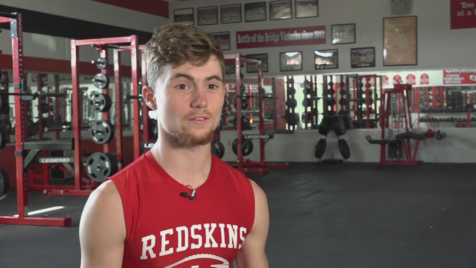 While the weight room is quiet at Loudon High School, Neyland Carroll on the football team is building his strength with his Bible.