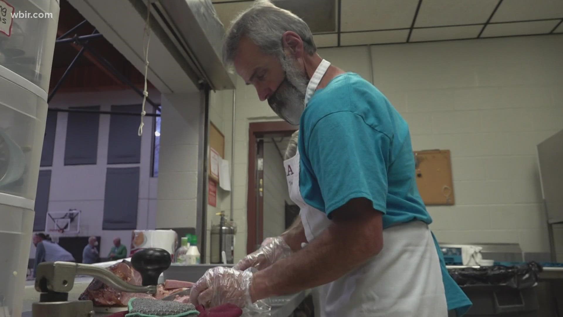 Volunteers at the Longer Table serve homemade meals from scratch for the homeless.