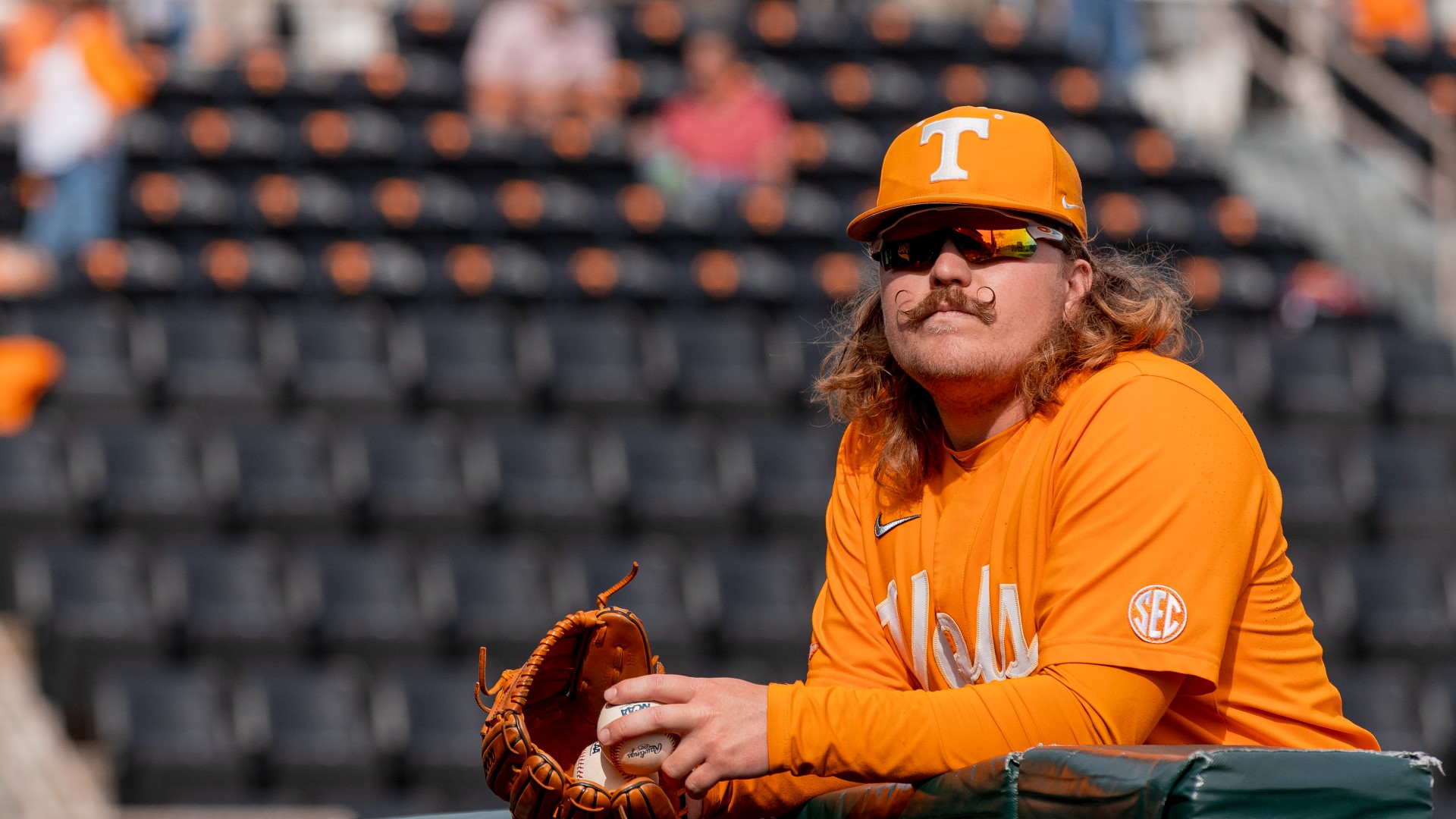 Tennessee pitcher Kirby Connell wears cleats with mustaches on them in ...