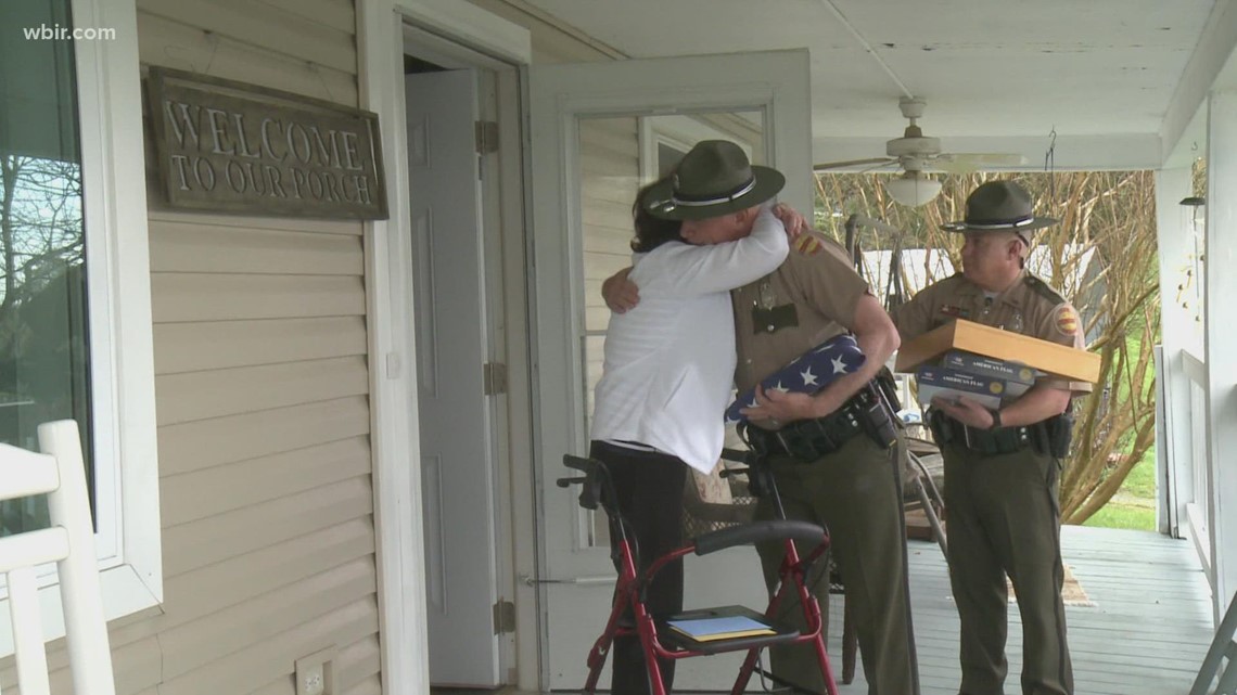 State troopers donate veteran flag to woman who lost home in fire - Vimarsana News