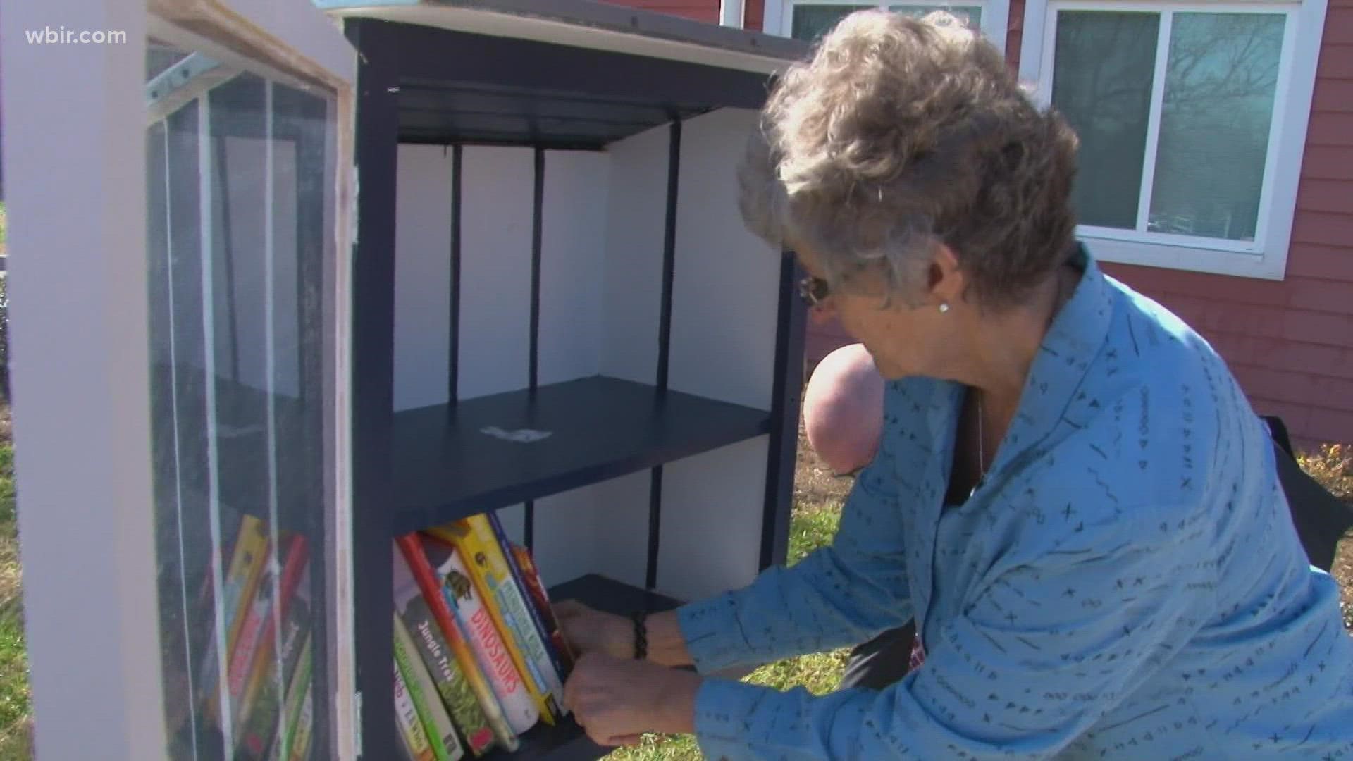Members of the Rotary Club of Knoxville opened a Little Free Library to serve people, nearly 40% of whom are children in the neighborhood.