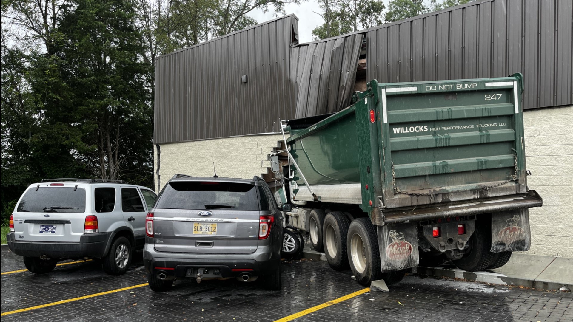 A dump truck crashed into a Maryville Dollar General early Thursday afternoon. Credit: Semper Fi Sheds
