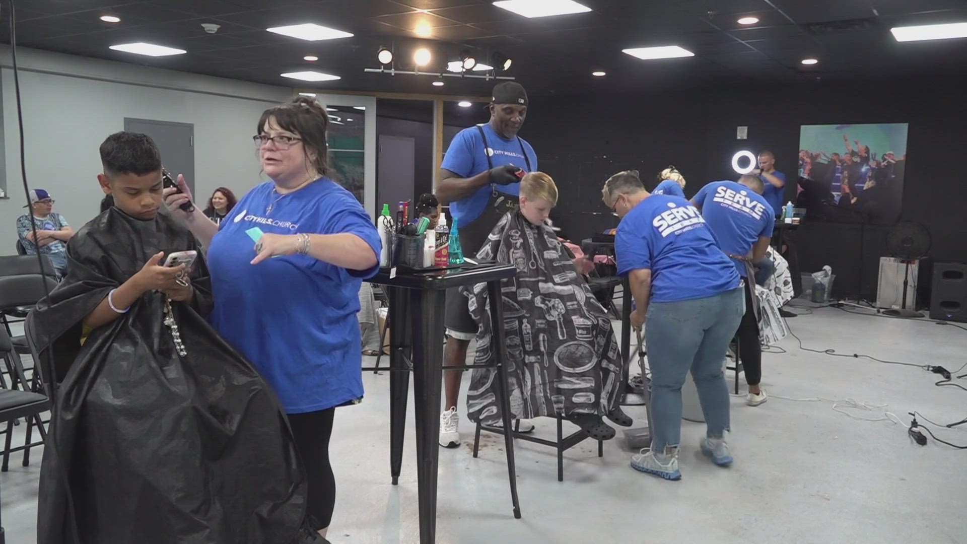 People of all ages and families served the community by setting up a food pantry, giving free haircuts to kids, changing people's oil, giving away gas and more.