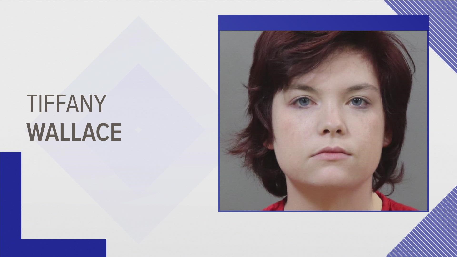 Knox County records show Tiffany Wallace got into an argument with the four people while she was on the front porch of her mobile home on Friday.