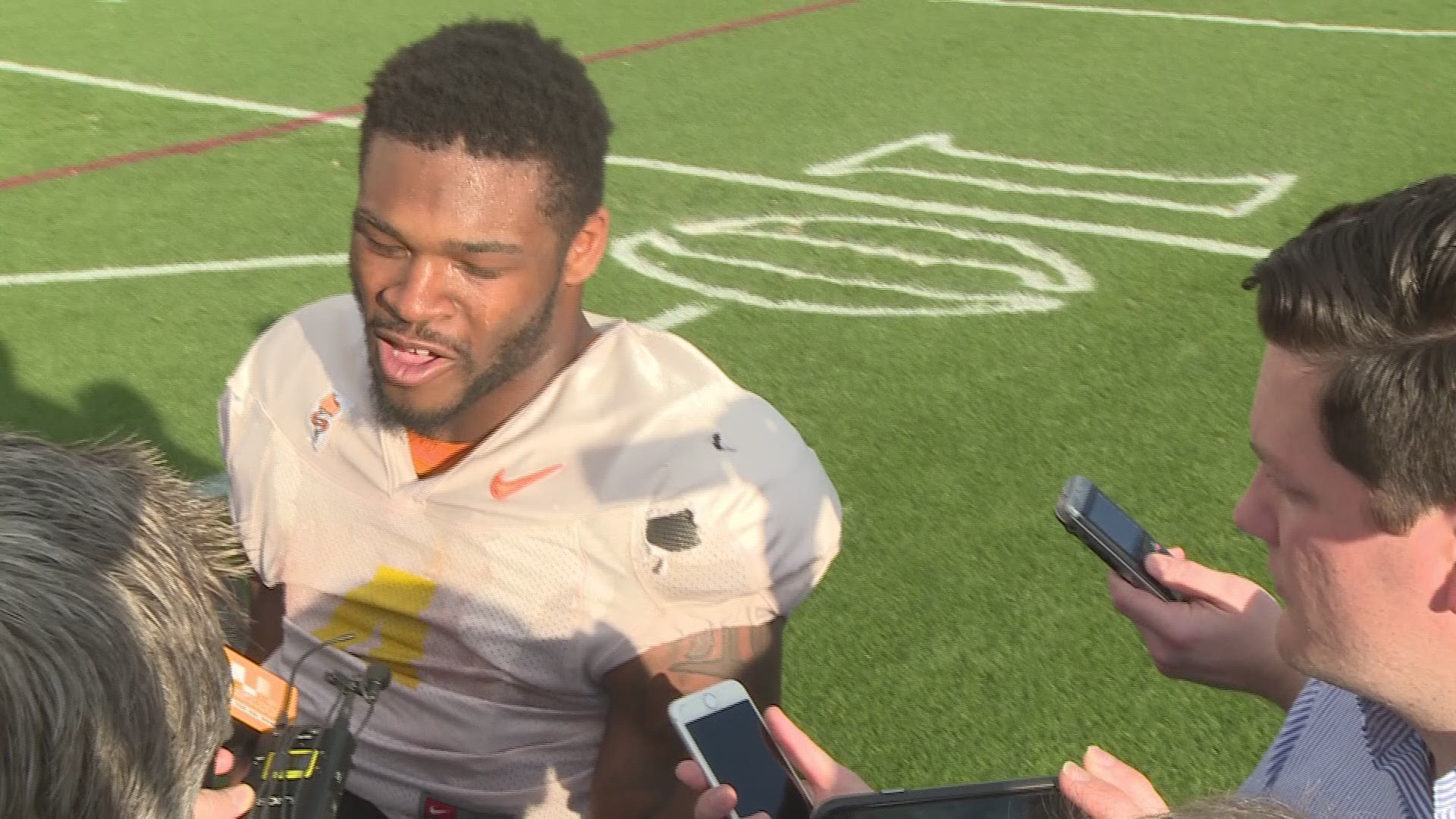 John Kelly speaks with the media after spring practice.