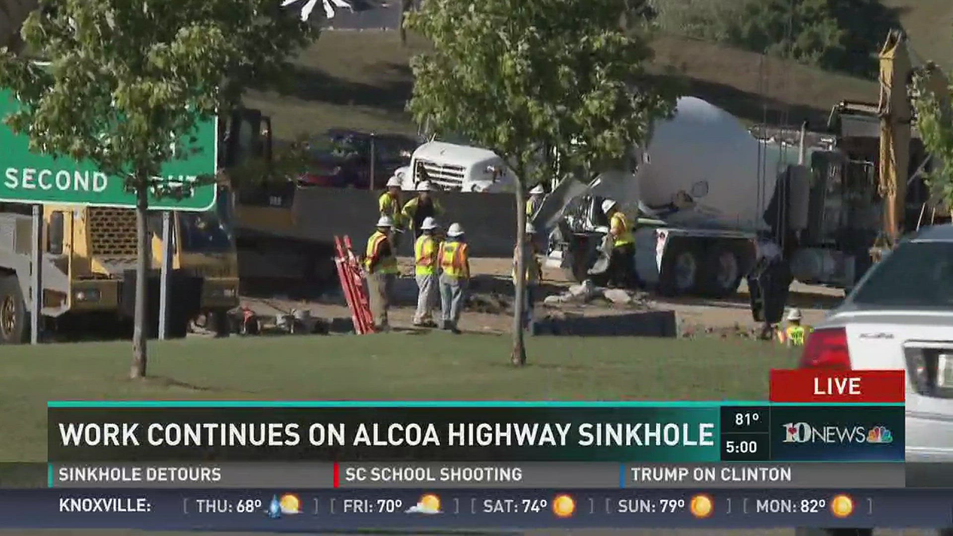 Sept. 28, 2016: Crews continue to repair a sinkhole on Alcoa Highway that opened up early Wednesday morning.